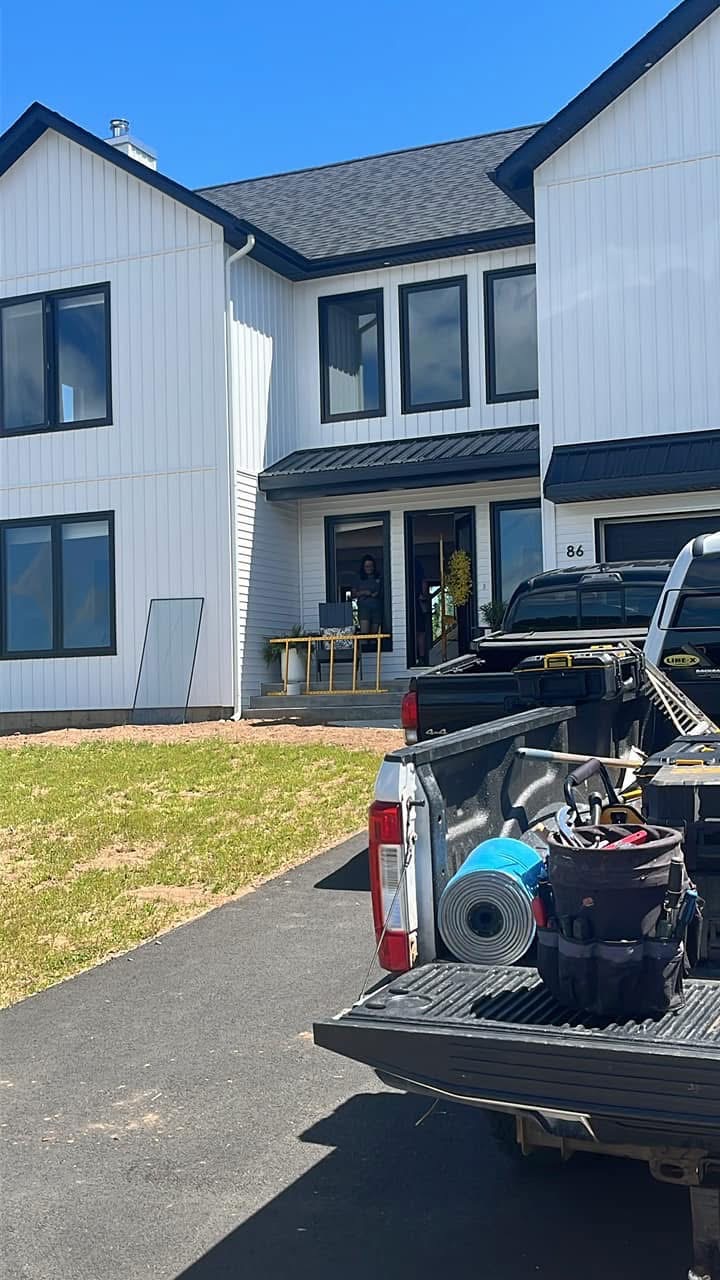 Nova Scotia home with new windows and navy front door